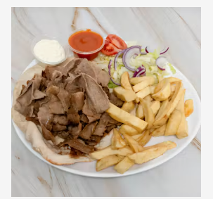 Freshly prepared Babylon doner kebab with salad